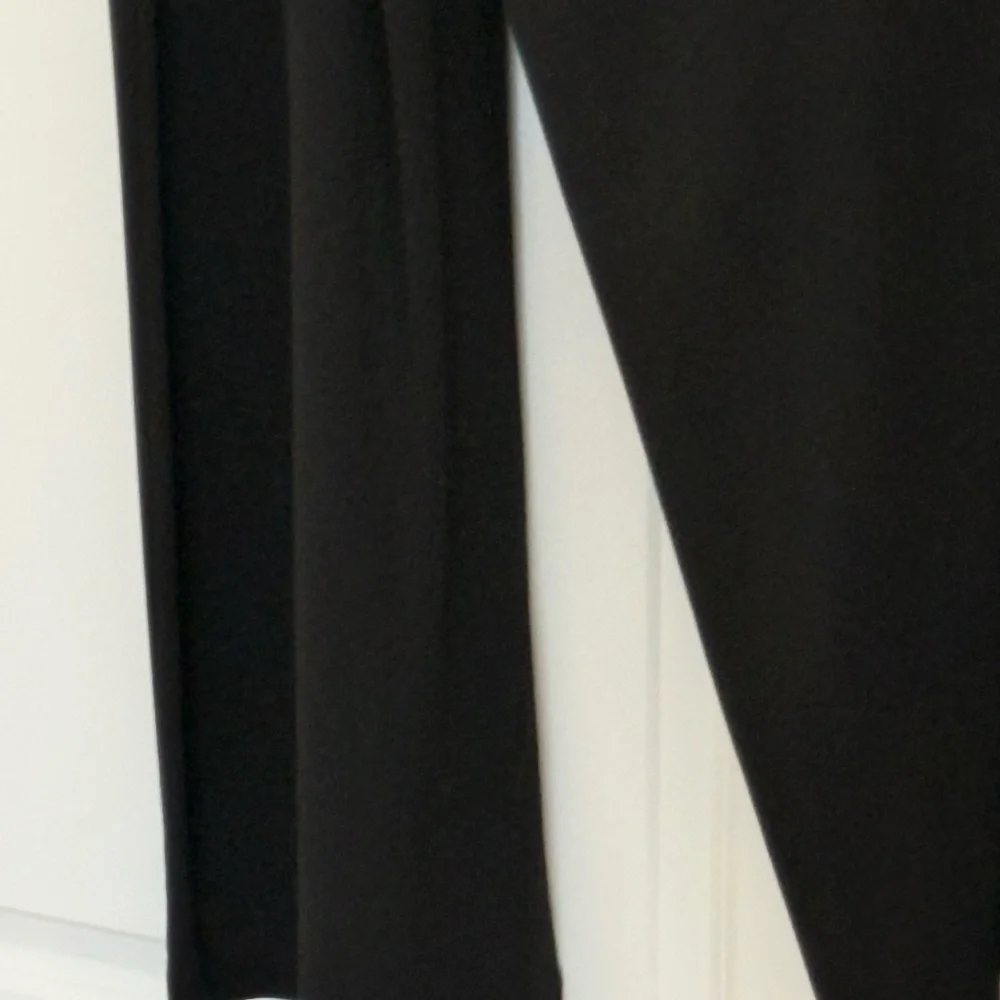Donna Karan Black Sleeveless Draped Jumpsuit with Gold Logo Detail - Picture 9 of 9